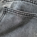 Asymmetric High-Waisted Straight-Leg Jeans in Light Wash Denim