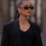 Slim Oval Frame Sunglasses with Vintage Appeal