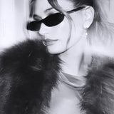 Slim Oval Frame Sunglasses with Vintage Appeal