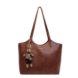 Soft Vegan Leather Tote Bag with Shoulder Straps and Plush Charm
