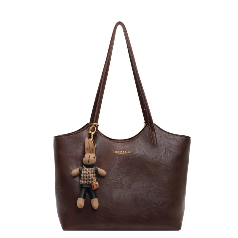 Soft Vegan Leather Tote Bag with Shoulder Straps and Plush Charm