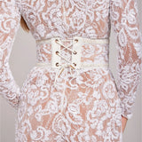 Sheer Embellished Long-Sleeve Jumpsuit with Sequin Floral Pattern and Belted Waist