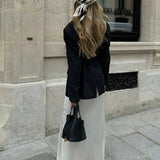 Elegant Textured Leather Bucket Bag with Gold Lock